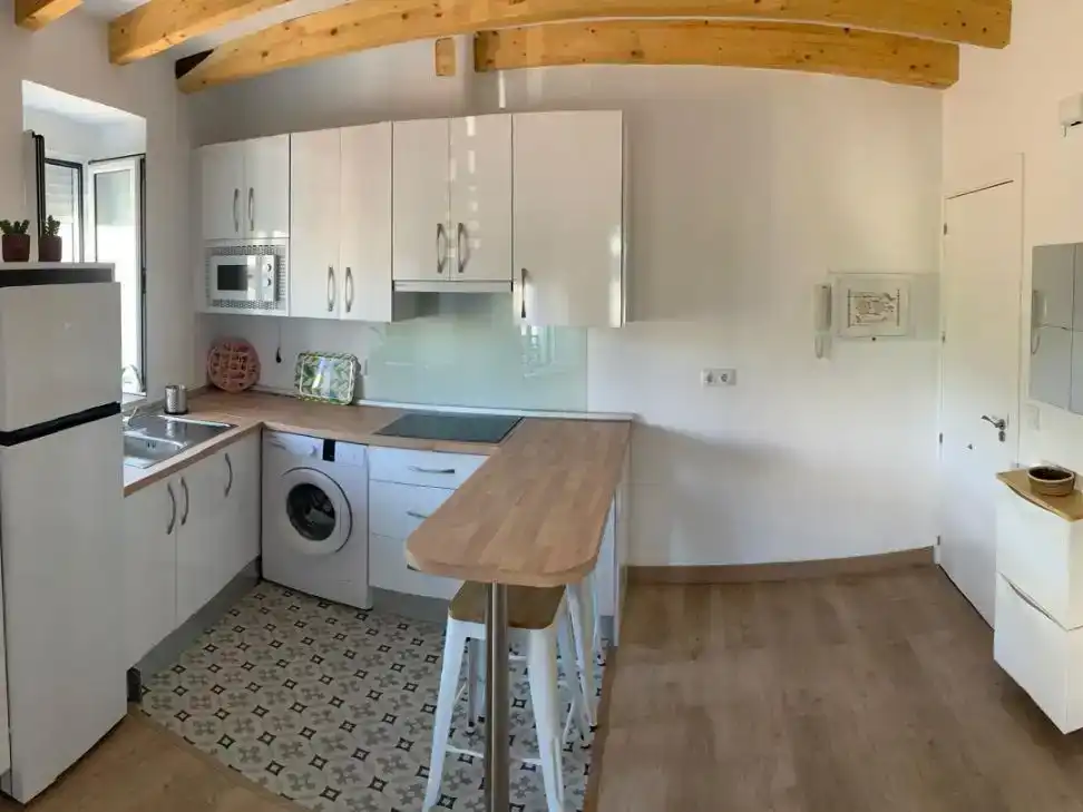 Cuina de Apartament de lloguer en Logrosán amb Aire condicionat, Parquet i Moblat