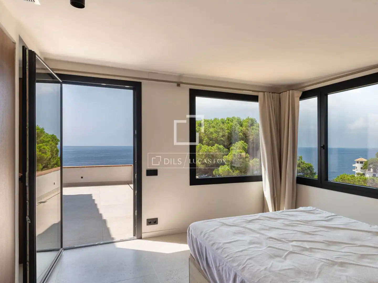 Schlafzimmer von Haus oder Chalet zum Verkauf in Lloret de Mar mit Klimaanlage, Heizung und Privatgarten