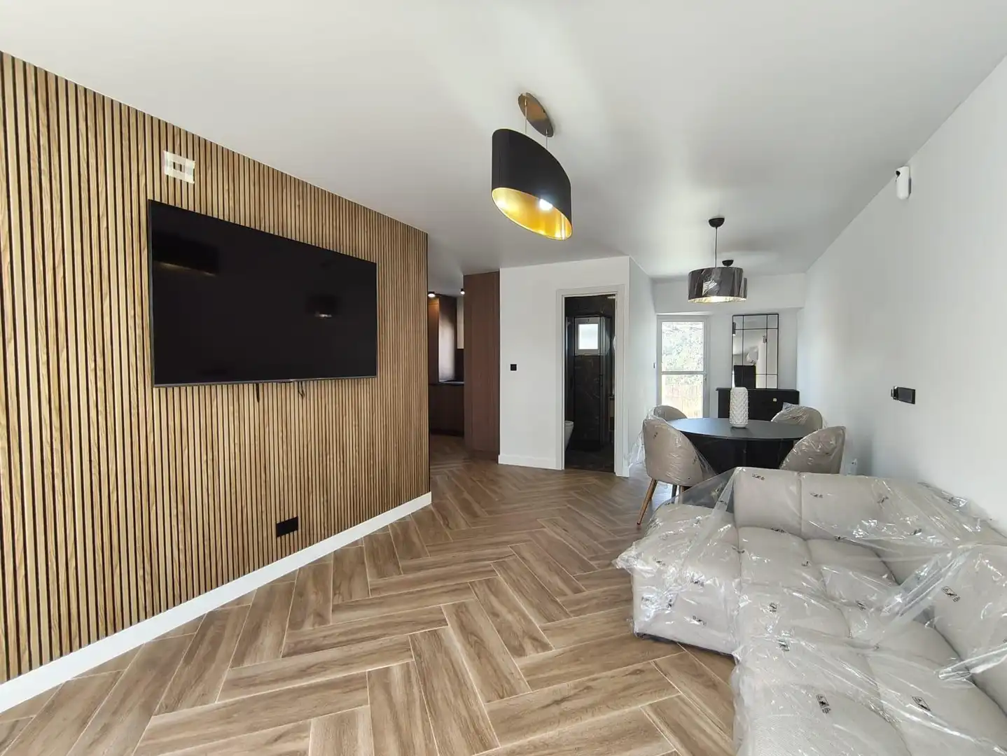 Sala de estar de Casa adosada en venta en La Nucia con Aire acondicionado, Calefacción y Jardín privado