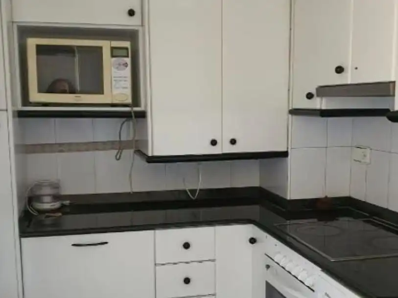 Kitchen of Flat for share in Peñacastillo - Nueva Montaña