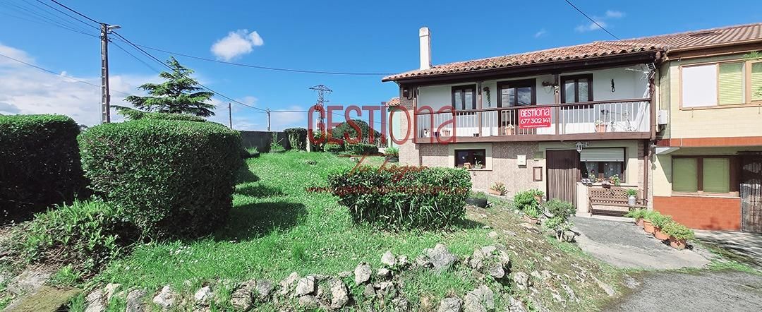 Vista exterior de Casa adosada en venda en Marina de Cudeyo amb Calefacció, Jardí privat i Balcó