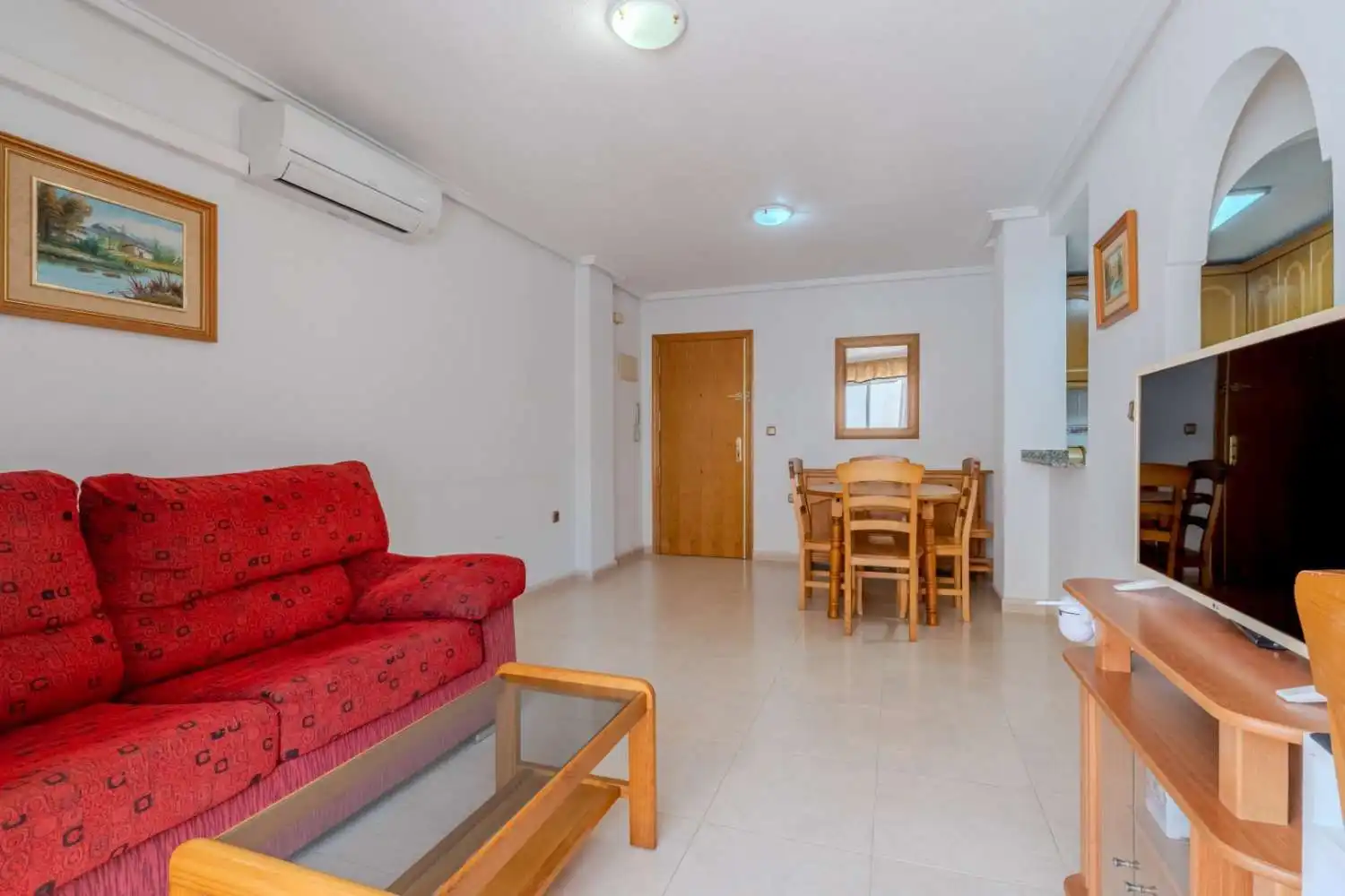 Sala d'estar de Apartament en venda en Torrevieja amb Aire condicionat, Terrassa i Traster