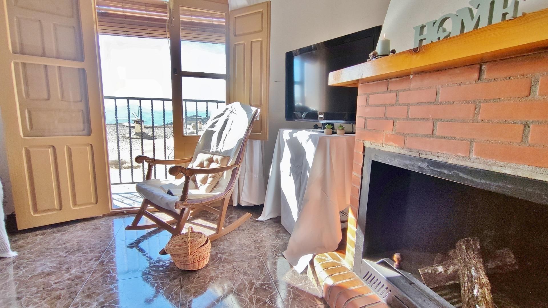 Sala d'estar de Casa o xalet en venda en Nevada amb Terrassa i Balcó