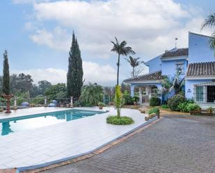 Swimming pool of House or chalet for sale in Málaga Capital  with Air Conditioner, Terrace and Swimming Pool