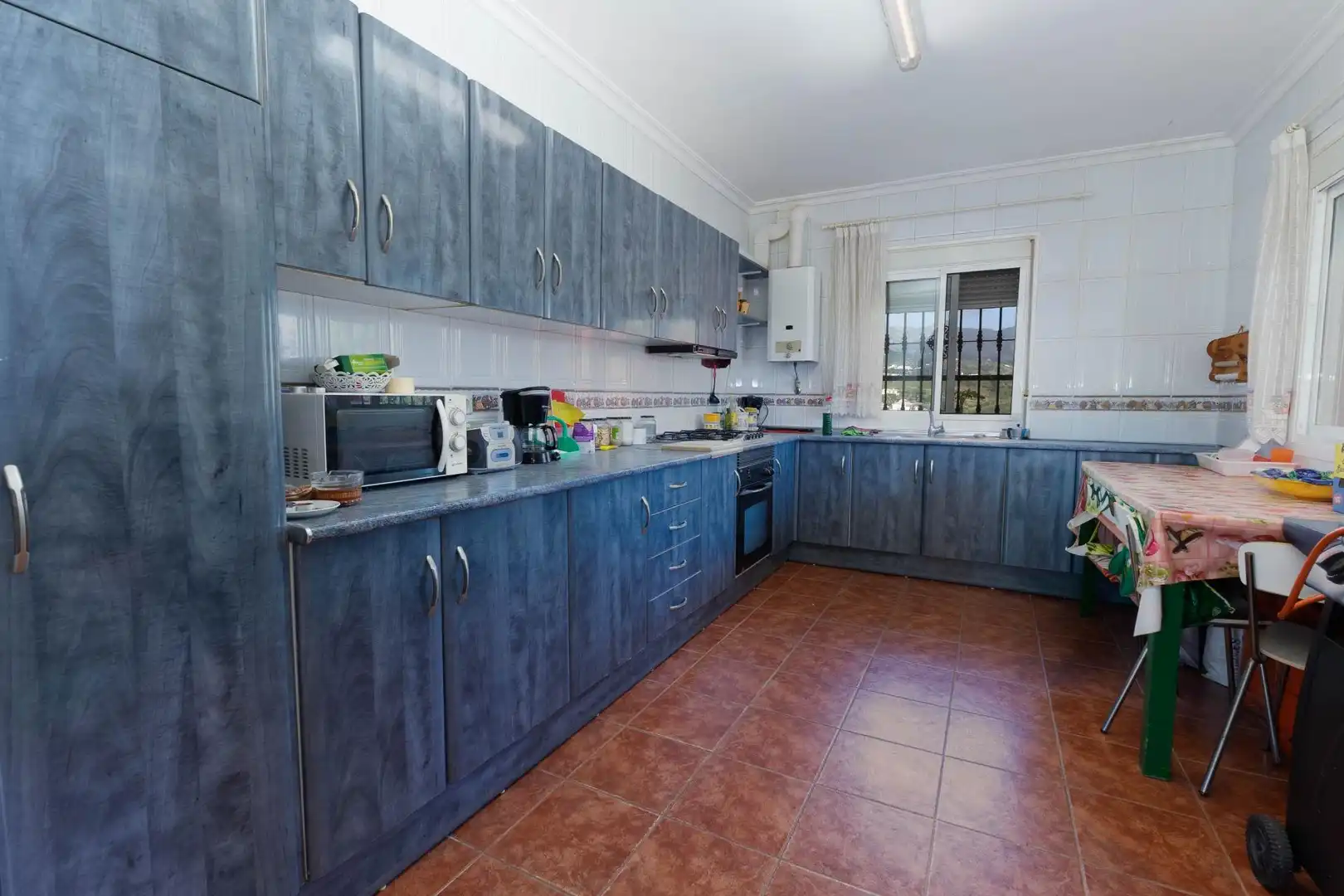 Cocina de Finca rústica en venta en Mijas con Aire acondicionado, Jardín privado y Terraza