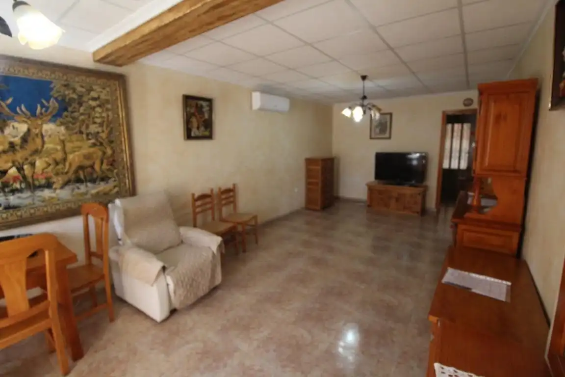 Sala de estar de Casa adosada en venta en Torrevieja con Aire acondicionado, Jardín privado y Terraza