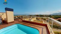 Swimming pool of Attic for sale in Oliva  with Air Conditioner, Terrace and Storage room