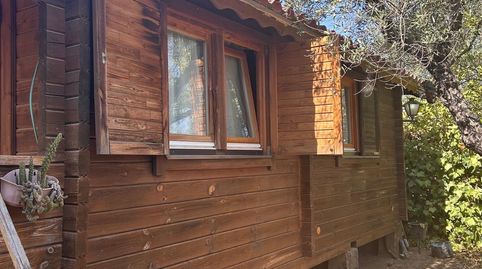 Parcela Rustica de 1.000 m2 con casa de madera y zona de recreo en Pilas