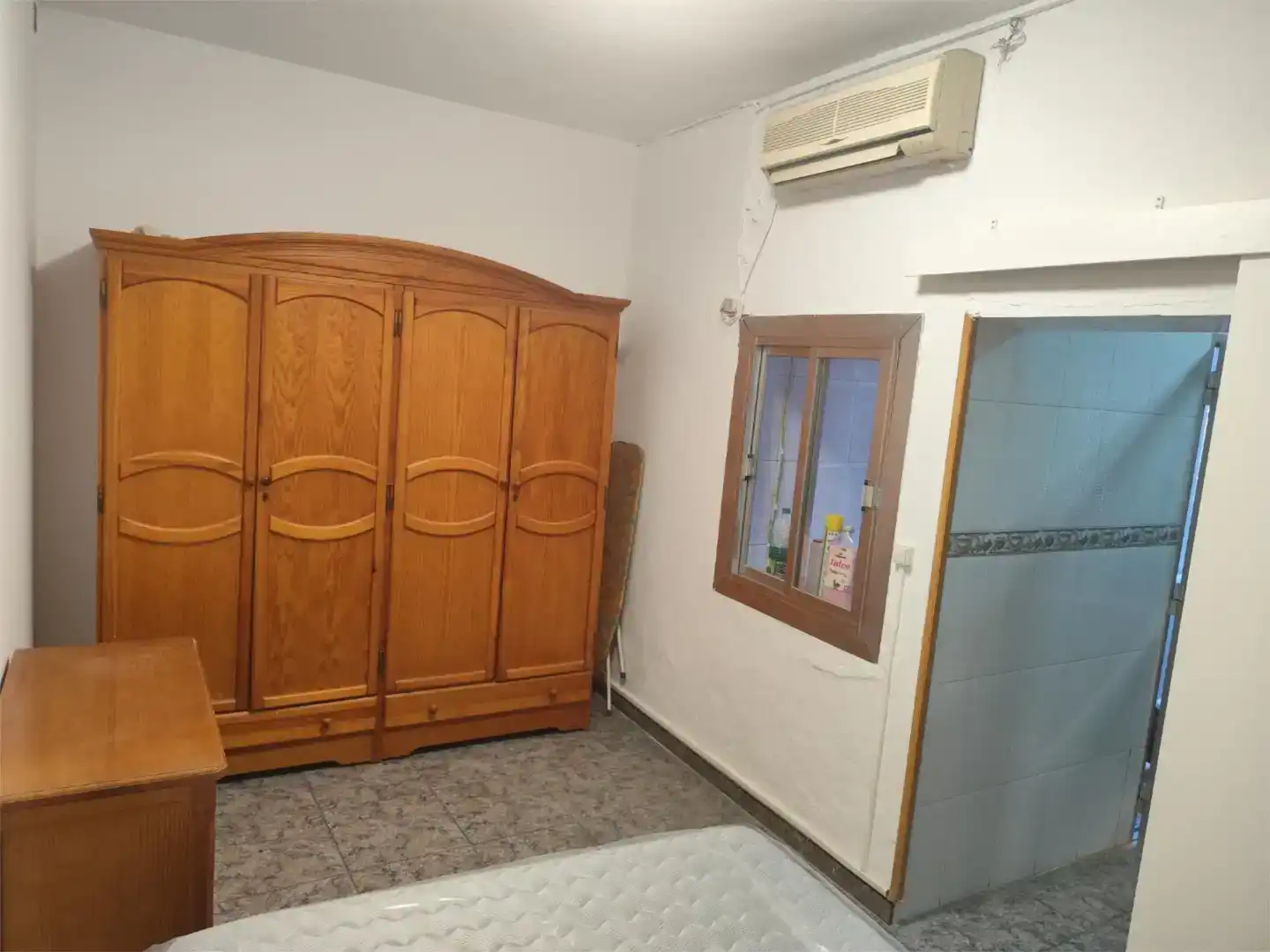 Dormitori de Casa adosada de lloguer en Almería amb Aire condicionat, Rentadora i Microones
