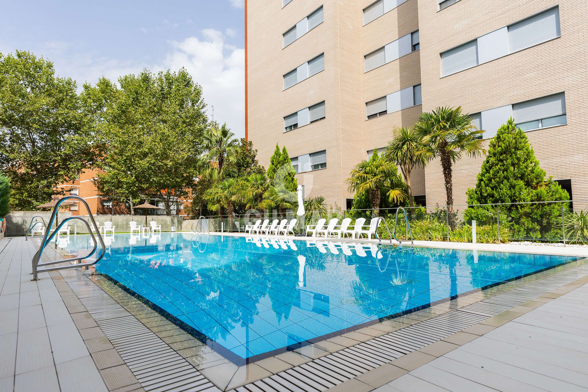 Swimming pool of Flat for sale in  Madrid Capital  with Heating, Private garden and Storage room