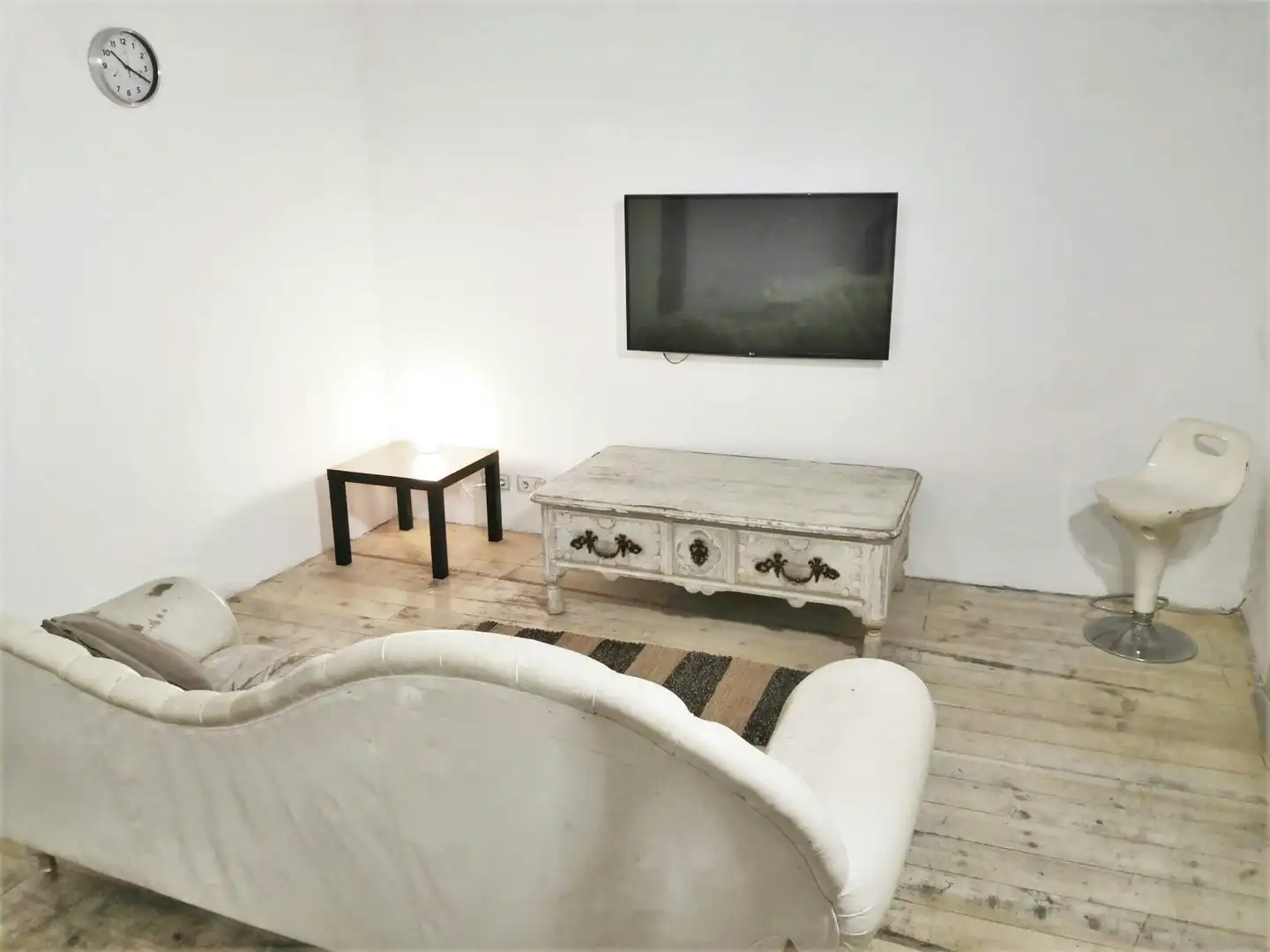 Sala de estar de Piso para compartir en Barcelona con Aire acondicionado, Calefacción y Amueblado