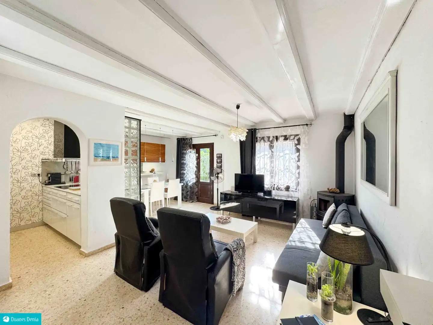 Sala d'estar de Casa adosada en venda en Dénia amb Aire condicionat, Jardí privat i Terrassa