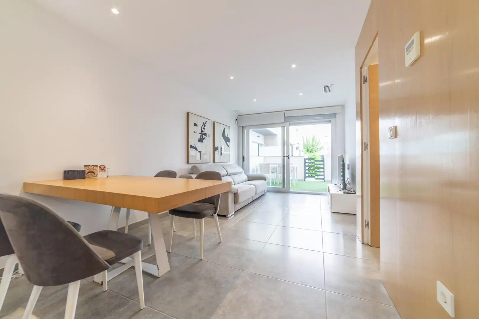 Sala d'estar de Casa adosada en venda en San Javier amb Aire condicionat, Jardí privat i Terrassa