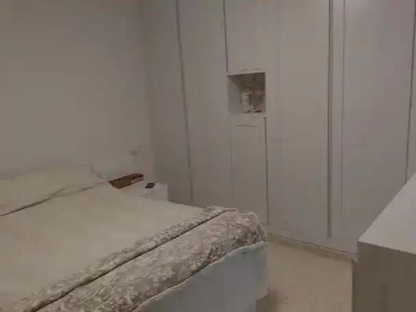 Dormitori de Casa adosada en venda en Lora del Río amb Aire condicionat