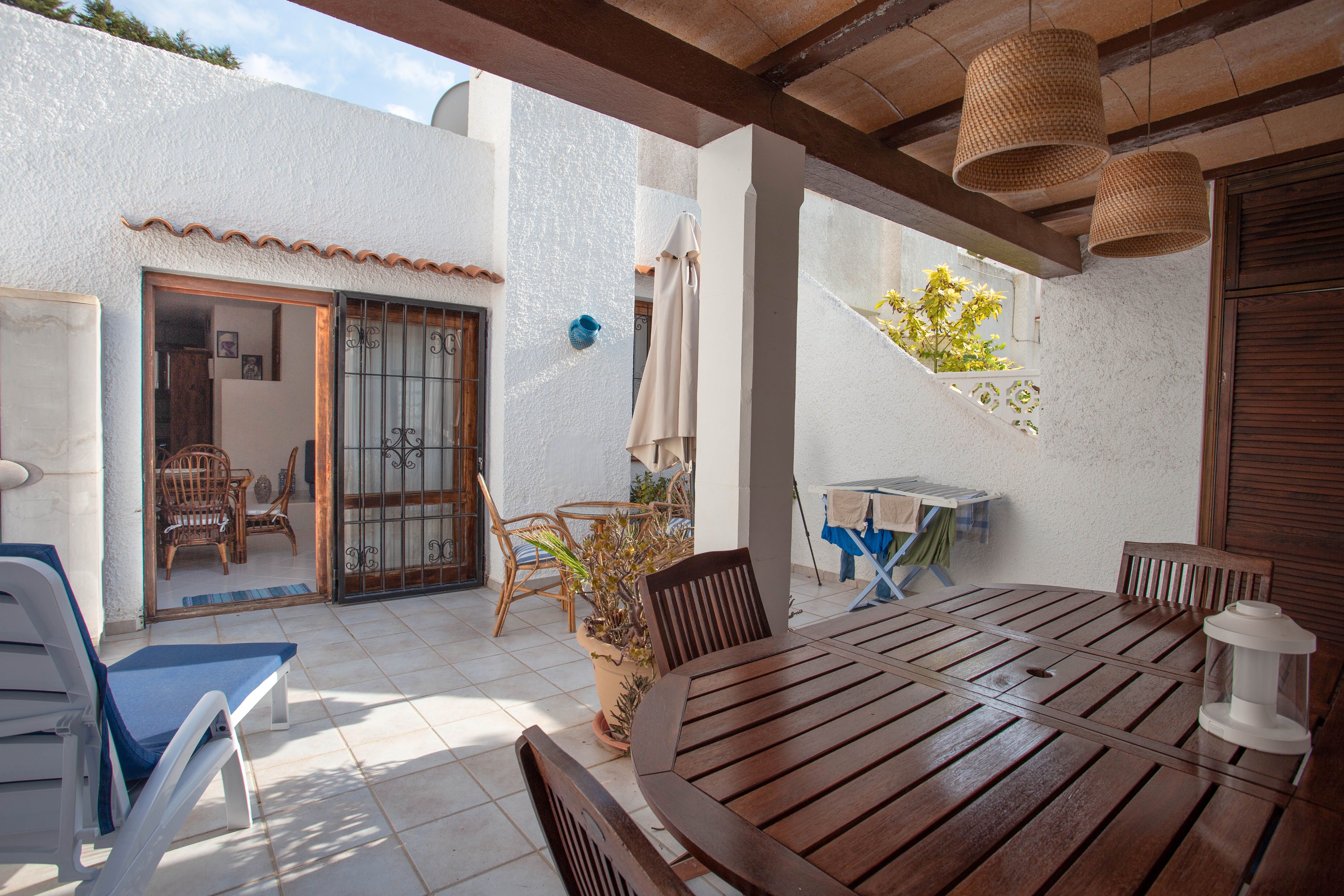 Terrassa de Casa adosada en venda en Sant Josep de sa Talaia amb Aire condicionat, Calefacció i Jardí privat