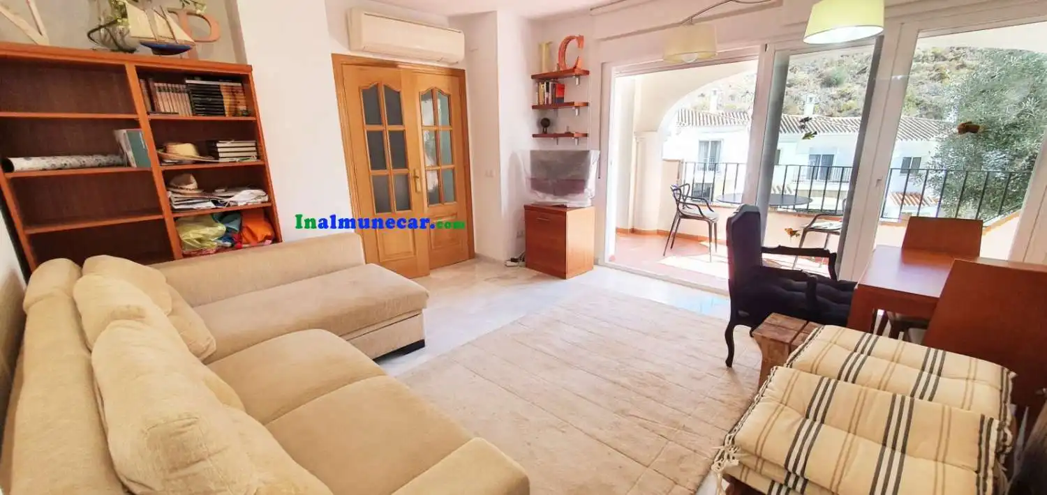 Sala de estar de Casa adosada en venta en Almuñécar con Aire acondicionado, Terraza y Piscina