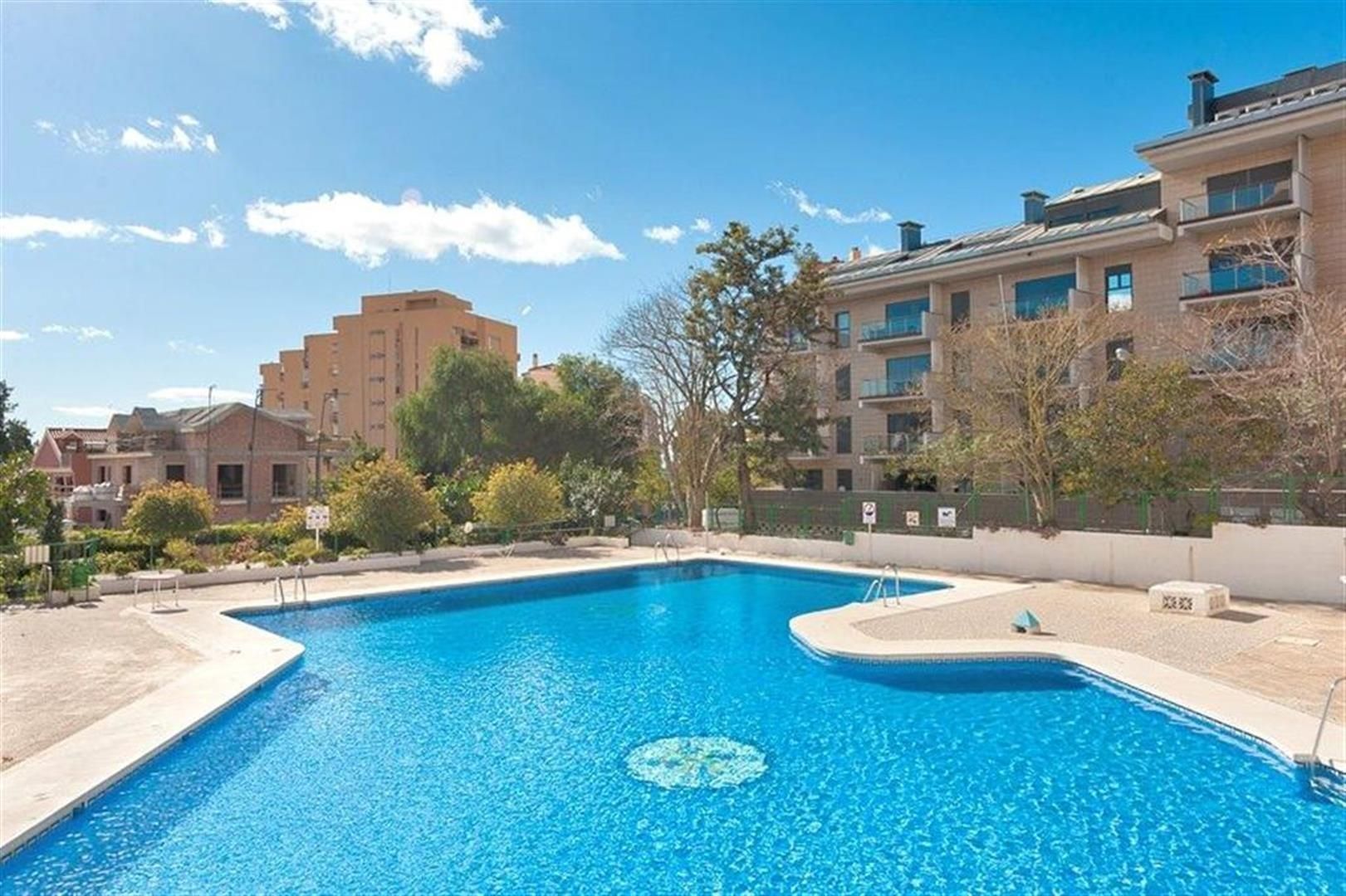 Swimming pool of Flat for sale in Benalmádena  with Alarm and Community pool