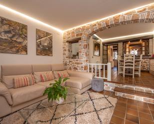 Sala d'estar de Casa adosada de lloguer en Castell-Platja d'Aro amb Calefacció, Jardí privat i Terrassa