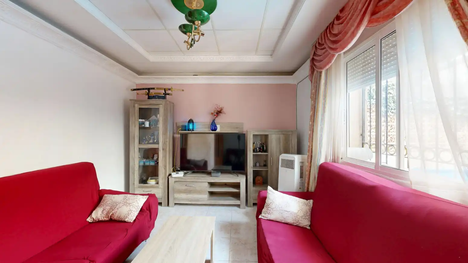 Sala d'estar de Casa adosada en venda en Cartagena amb Aire condicionat i Jardí privat