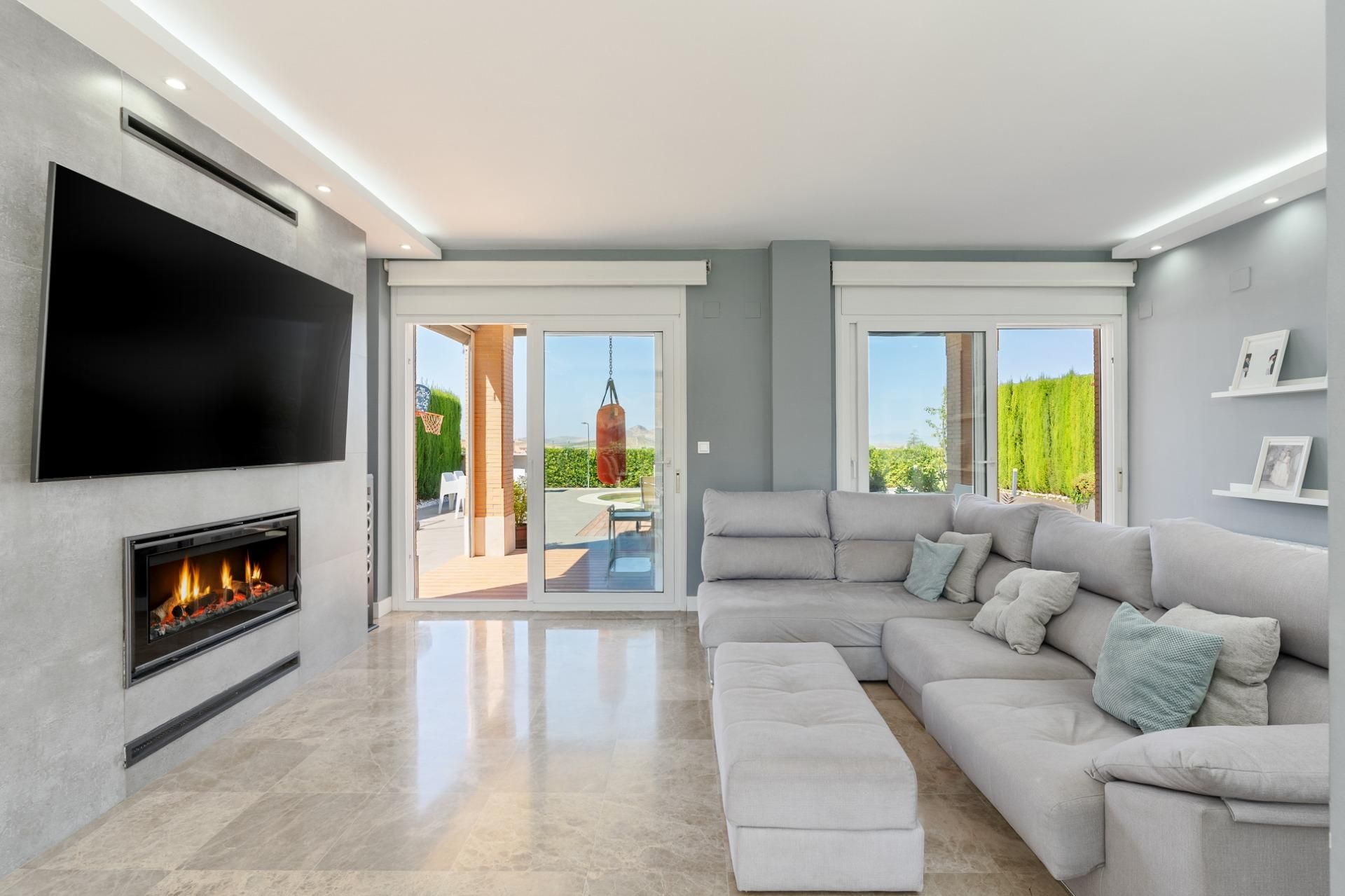 Sala d'estar de Casa o xalet en venda en Villa de Otura amb Aire condicionat, Calefacció i Jardí privat