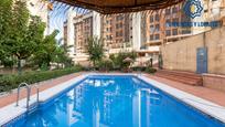 Swimming pool of Flat for sale in  Granada Capital  with Heating, Parquet flooring and Community pool