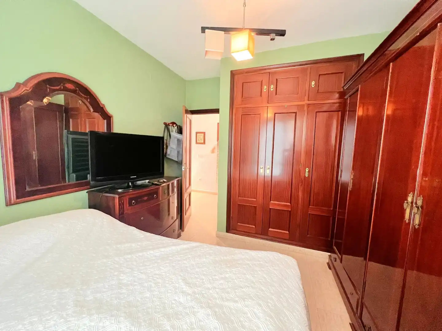 Habitación de Casa adosada en venta en Ayamonte con Aire acondicionado, Terraza y Trastero