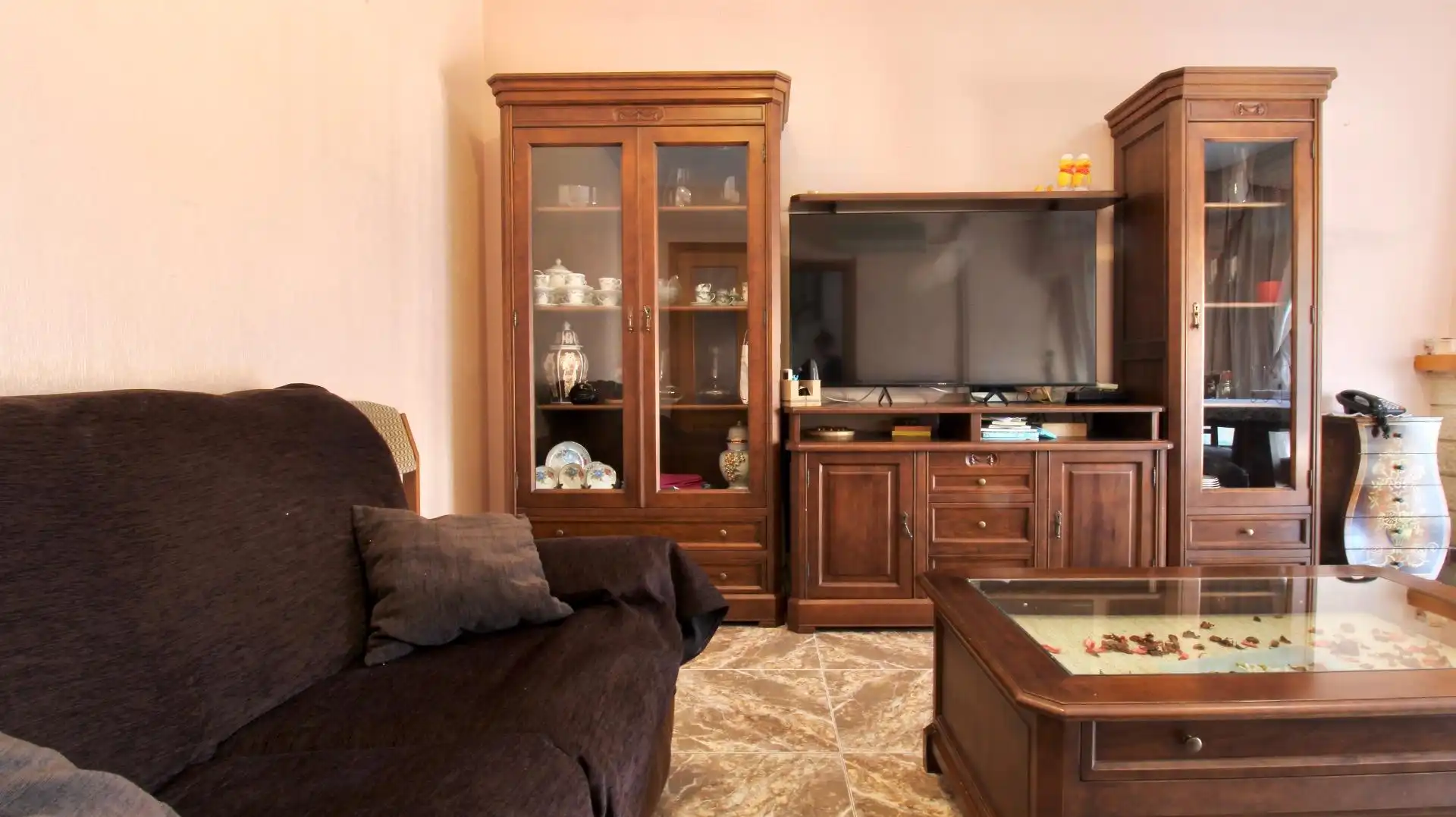 Sala de estar de Casa adosada en venta en Roquetas de Mar con Aire acondicionado, Terraza y Trastero