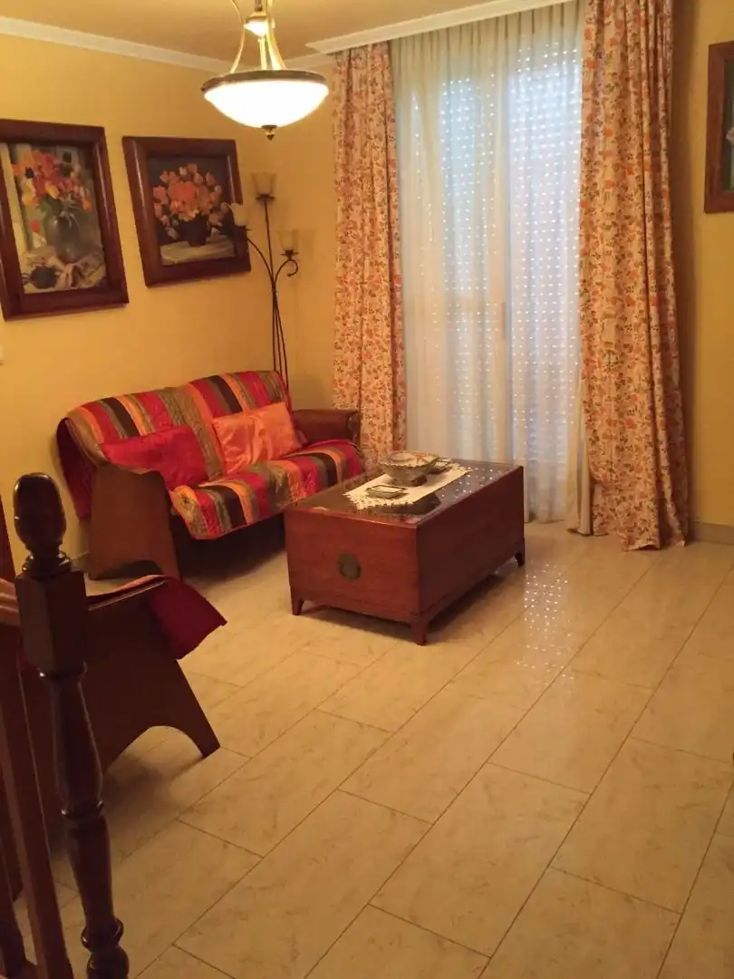 Sala de estar de Casa adosada en venta en Melilla con Aire acondicionado, Jardín privado y Terraza