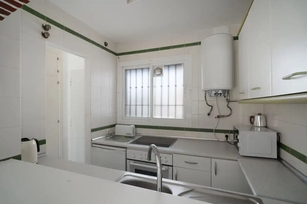Cuina de Apartament en venda en Torremolinos amb Aire condicionat i Piscina comunitària