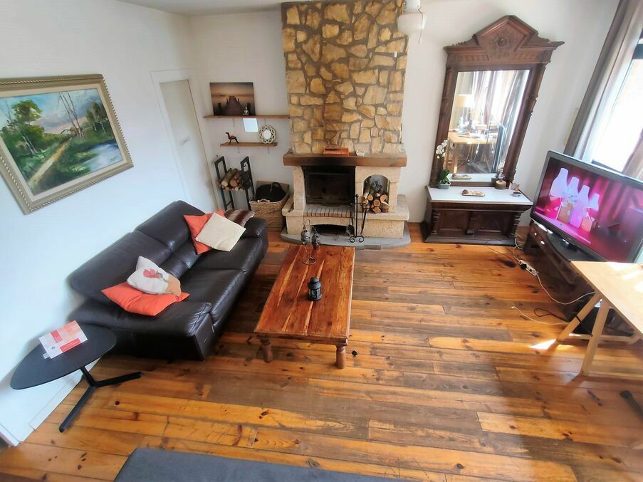 Living room of House or chalet for sale in Sant Feliu de Buixalleu  with Private garden, Parquet flooring and Swimming Pool