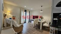 Living room of Flat for sale in Sant Cugat del Vallès  with Air Conditioner, Swimming Pool and Balcony