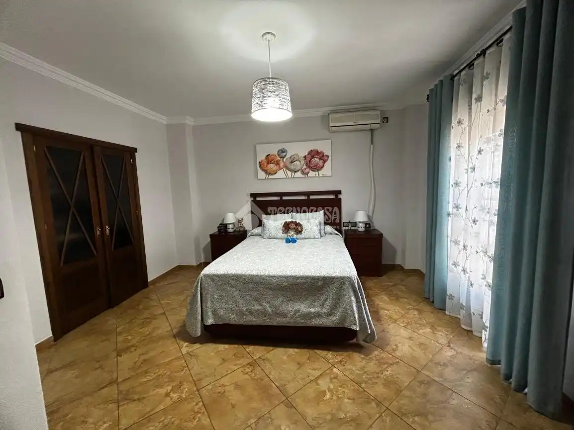 Habitación de Casa adosada en venta en Alcalá del Río con Aire acondicionado