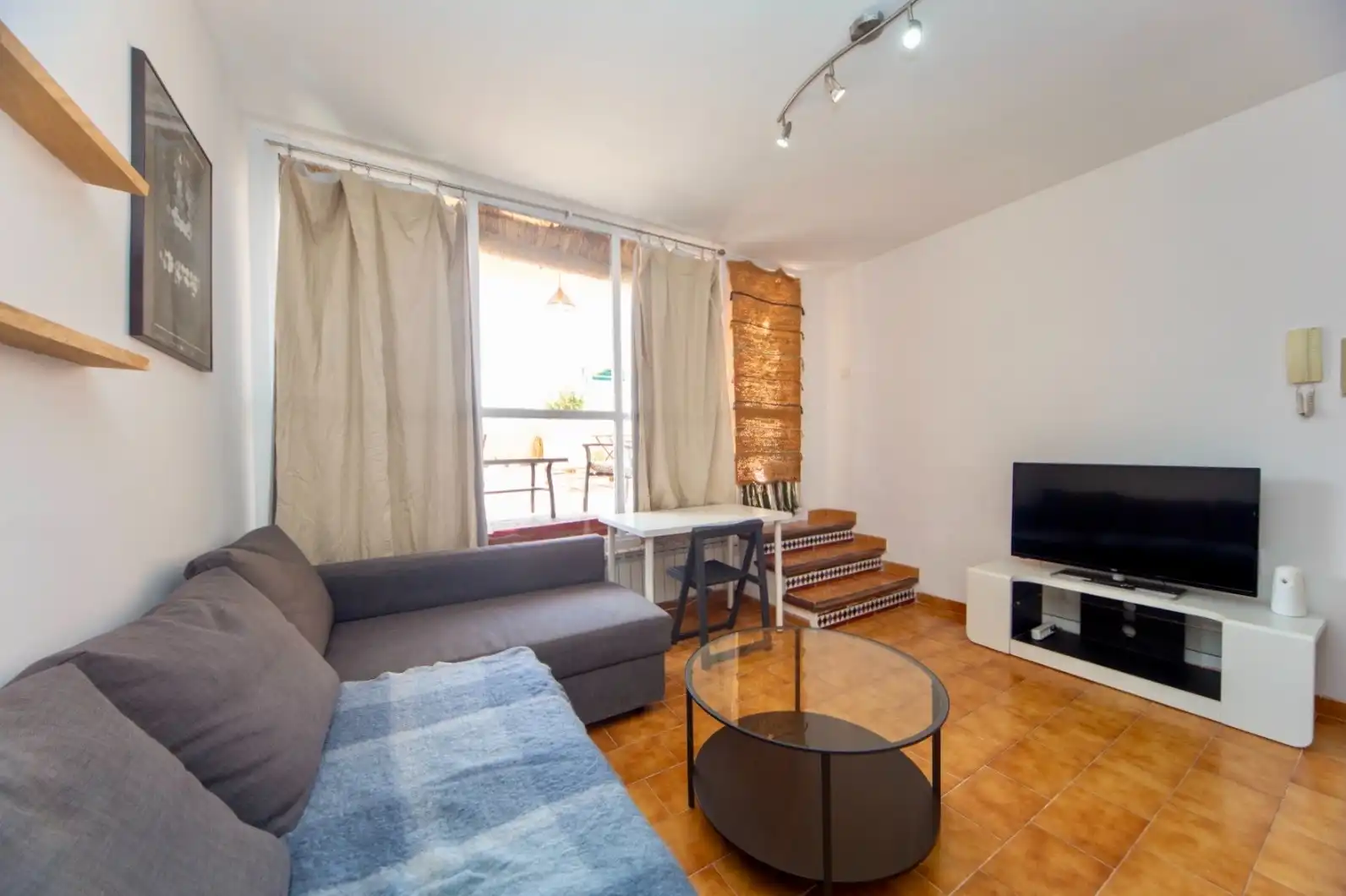 Sala d'estar de Apartament de lloguer en Granada amb Calefacció, Terrassa i Moblat