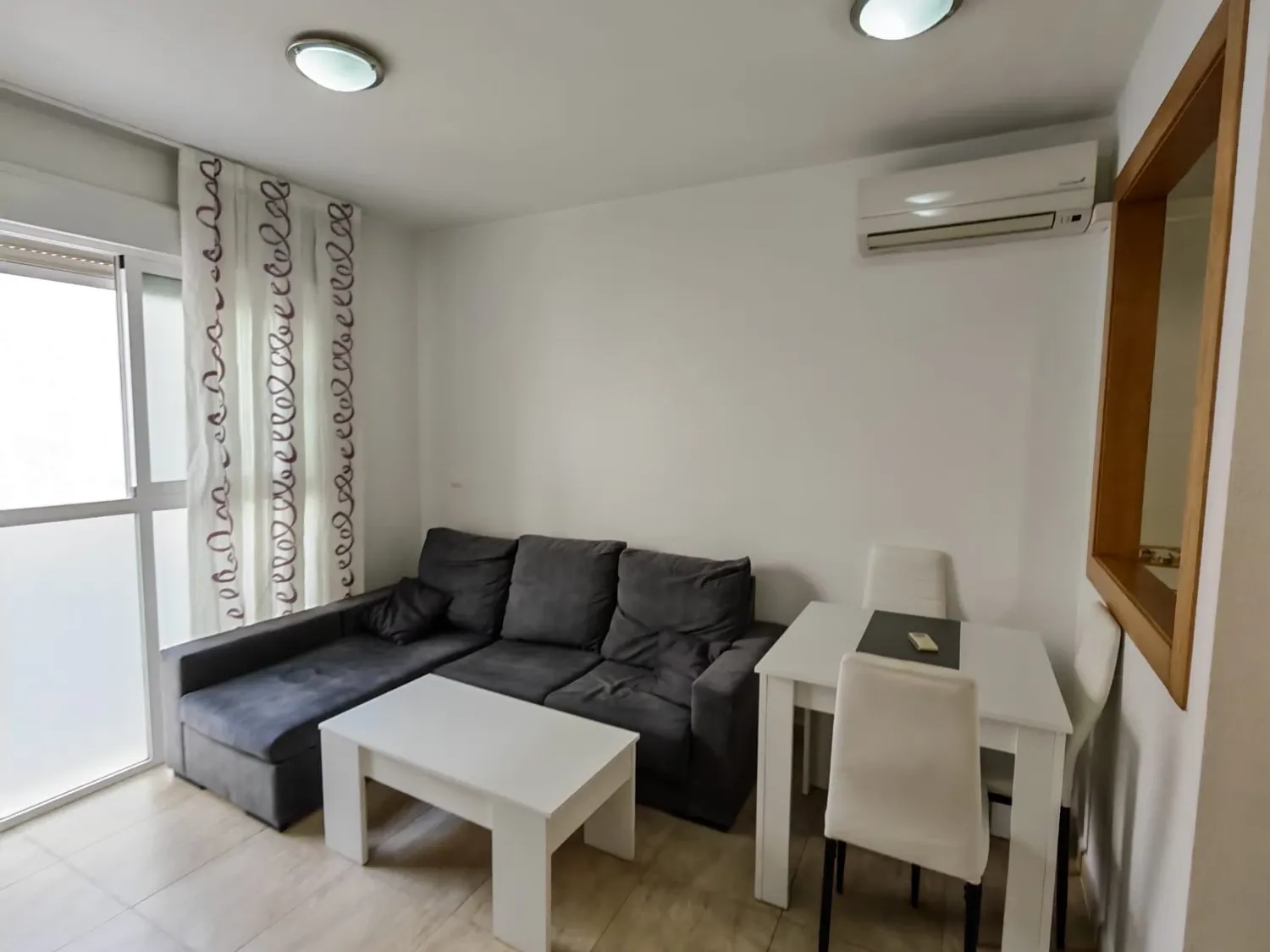 Sala de estar de Apartamento de alquiler en  Murcia Capital con Aire acondicionado, Calefacción y Amueblado