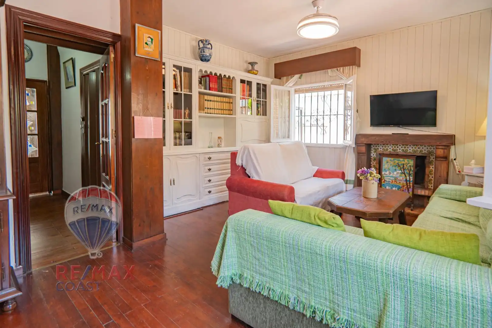 Sala de estar de Casa adosada en venta en Málaga con Aire acondicionado, Jardín privado y Terraza