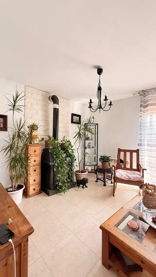 Sala de estar de Casa adosada en venta en Calafell con Aire acondicionado, Calefacción y Jardín privado