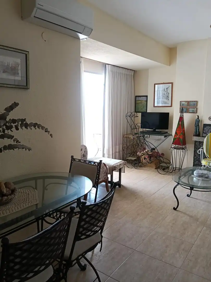 Sala d'estar de Apartament de lloguer en Cullera amb Aire condicionat, Terrassa i Moblat