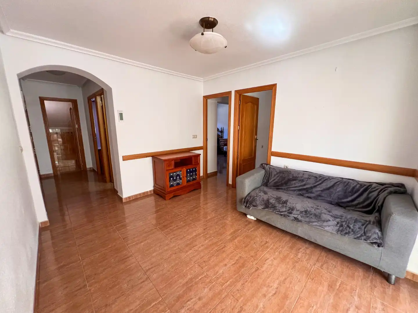 Sala de estar de Casa adosada en venta en Torrevieja con Aire acondicionado, Calefacción y Jardín privado