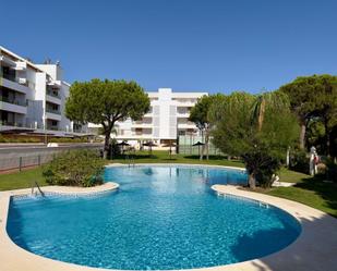 Piscina de Apartament en venda en El Portil amb Aire condicionat, Calefacció i Jardí privat