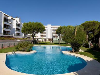 Swimming pool of Apartment for sale in El Portil  with Air Conditioner, Heating and Private garden