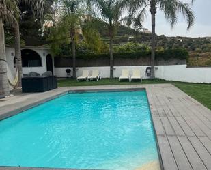 Piscina de Casa o xalet de lloguer en Salobreña amb Aire condicionat, Jardí privat i Parquet