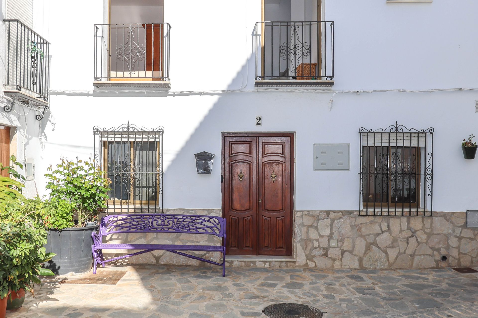 Vista exterior de Casa adosada en venda en Yunquera amb Jardí privat