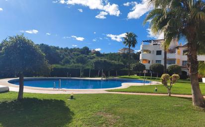 Swimming pool of Apartment for sale in Benalmádena  with Air Conditioner, Private garden and Parquet flooring