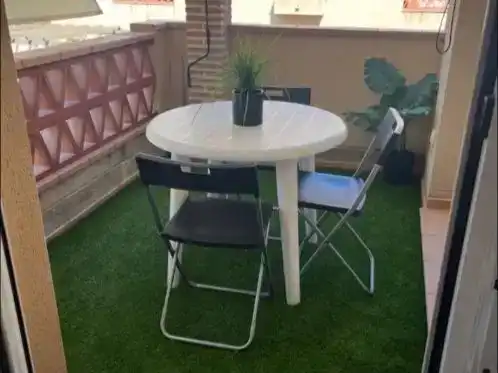 Terrassa de Apartament de lloguer en Oliva amb Aire condicionat, Piscina i Moblat