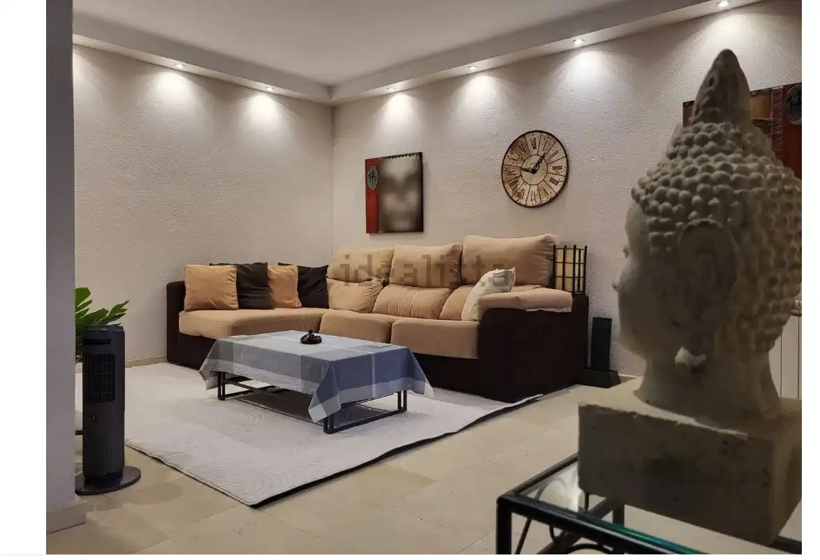 Sala d'estar de Casa adosada en venda en Villaviciosa de Odón amb Aire condicionat, Calefacció i Jardí privat