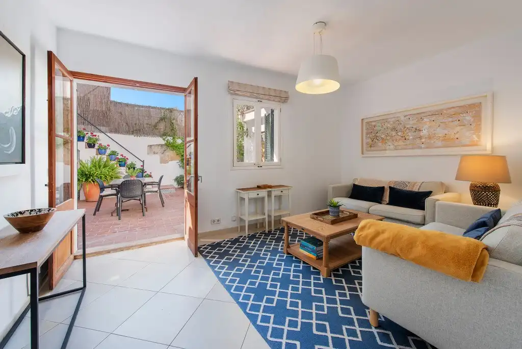 Sala de estar de Casa adosada en venta en Pollença con Aire acondicionado, Jardín privado y Terraza