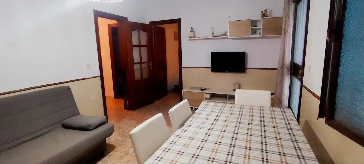 Sala d'estar de Casa adosada en venda en Linares