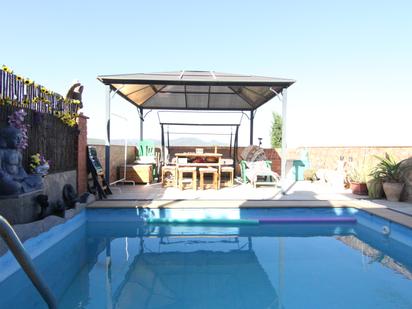 Swimming pool of Single-family semi-detached for sale in Esparreguera  with Air Conditioner, Terrace and Swimming Pool