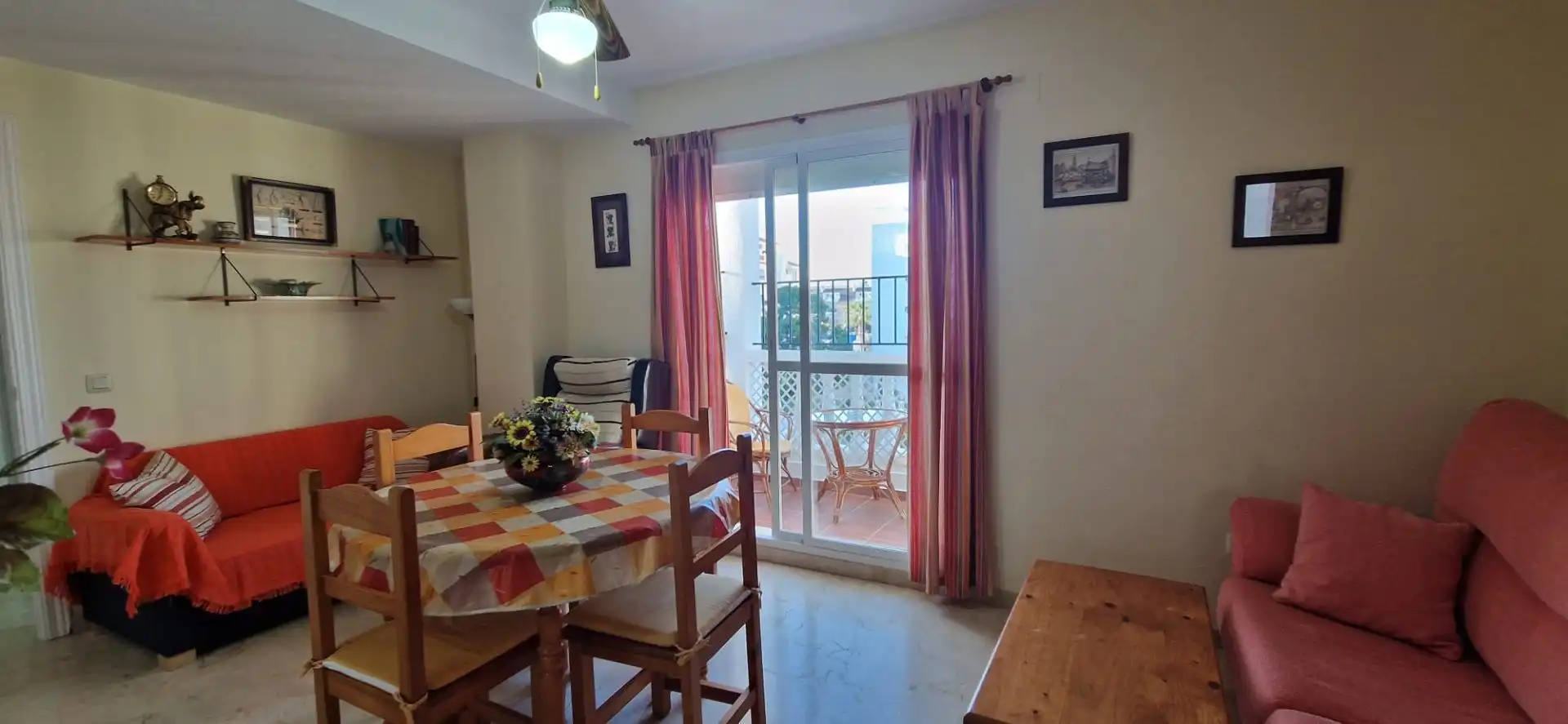 Menjador de Apartament de lloguer en El Portil amb Piscina comunitària