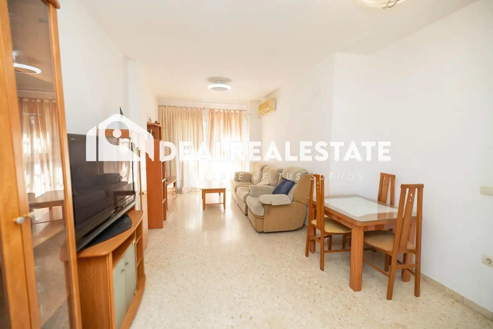 Sala d'estar de Pis en venda en La Rinconada amb Aire condicionat, Terrassa i Moblat